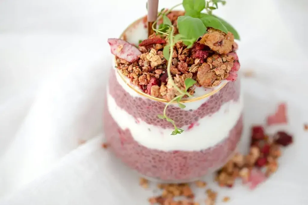 Fiber-rich oatmeal breakfast with fresh berries and chia seeds for pre-wedding diet for gut health